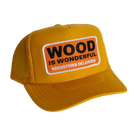 Yellow cap with 'Wood is Wonderful' patch on a white background