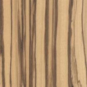 Close-up view of a piece of zebrawood lumber displaying its wood grain.