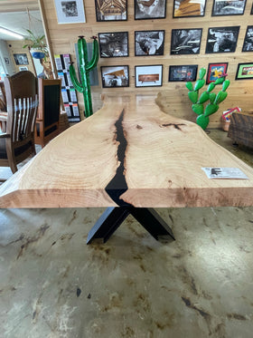 Live edge pecan slab with rich golden-brown tones, natural grain patterns, and organic edges
