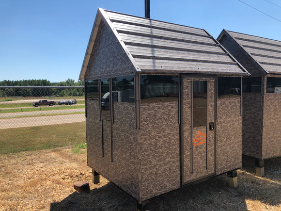 metal deer blind with door and bow windows in texas