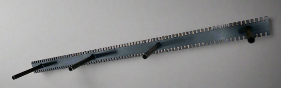 A floating mantel bracket, made from steel, for a fireplace mantel.