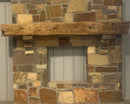 hand hewn reclaimed beam fireplace mantel mounted to stone wall
