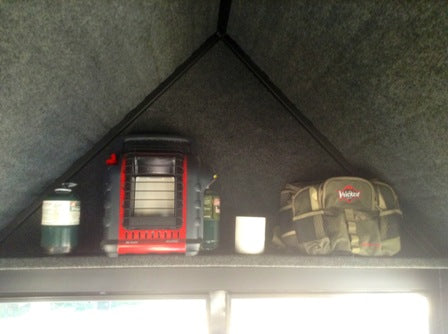 Storage shelf in an antler shed deer blind. 